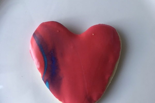 Red heart shaped cookie.